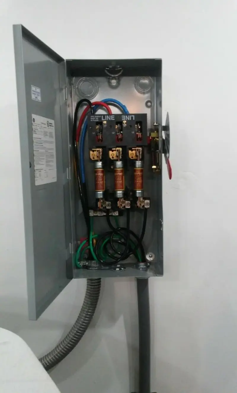 Three-phase disconnect switch installed for Smoke Detector Installation in Burnt Mills